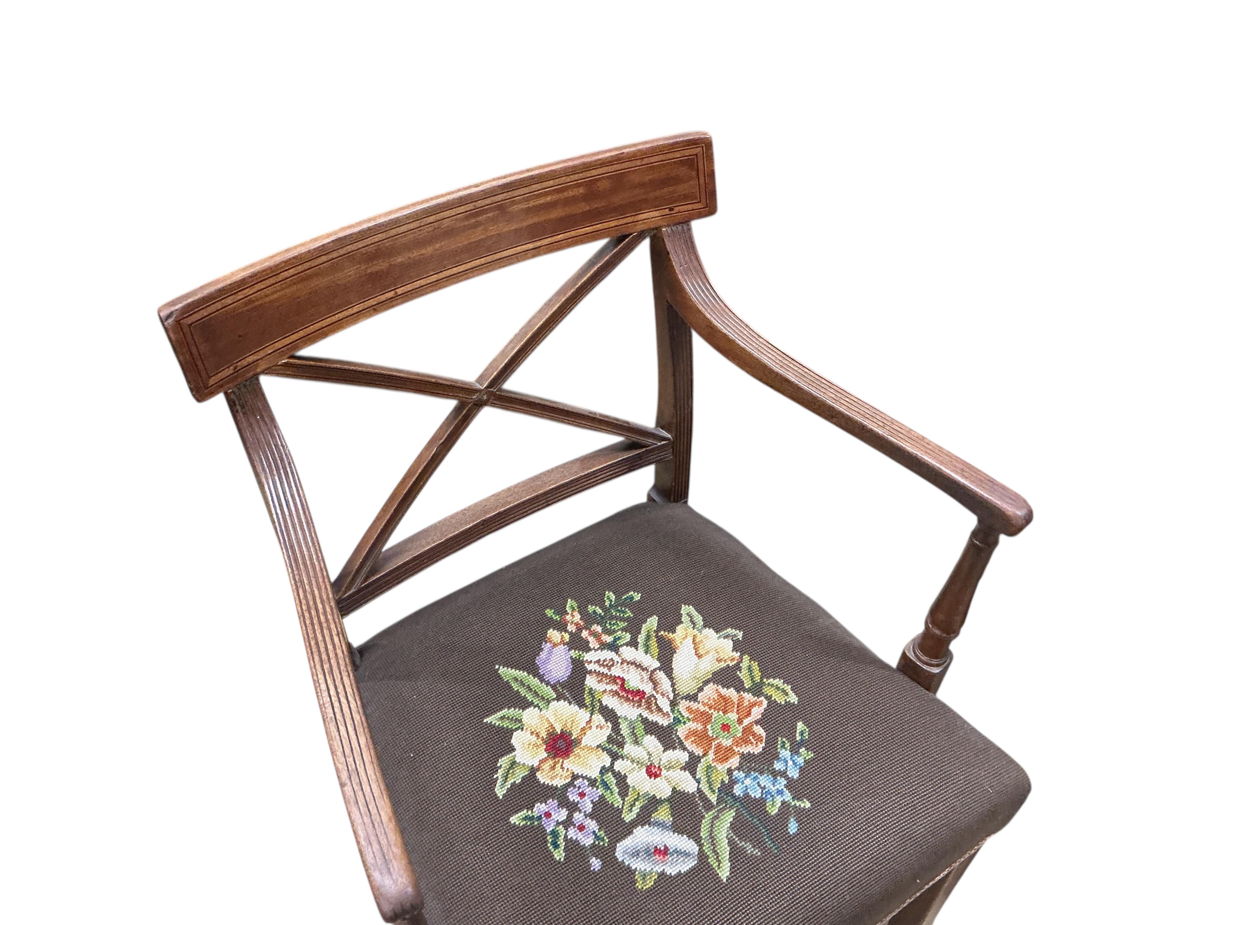 Two early 19th century mahogany elbow chairs, larger 54cm, depth 50cm, height 91cm